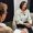 A journalist and a specialist conduct an insightful interview, sharing knowledge in a professional setting.