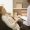 Psychiatrist holding a tablet and interviewing her lying patient during a therapy session