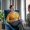 Asian psychoanalyst. Asian dark-haired psychoanalyst listening to woman wearing military uniform
